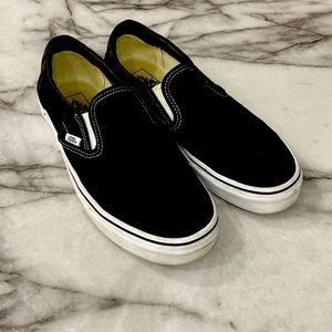 Lightly worn slip-on vans.